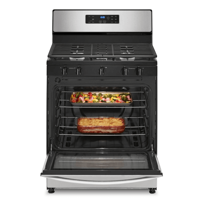 GE 5.1 Cu. Ft. Freestanding Gas Range with Edge to Edge Cooktop open with food inside product image